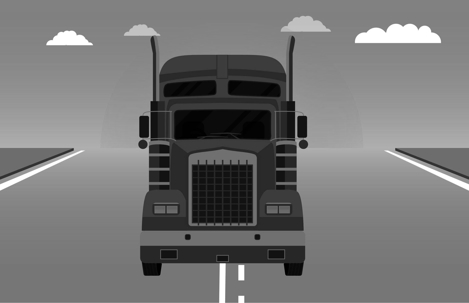 semi truck driving down the freeway